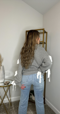 BOW OBSESSION SWEATER