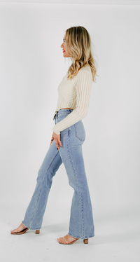 ASYMMETRICAL HEM RIBBED SWEATER
