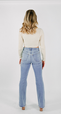 ASYMMETRICAL HEM RIBBED SWEATER